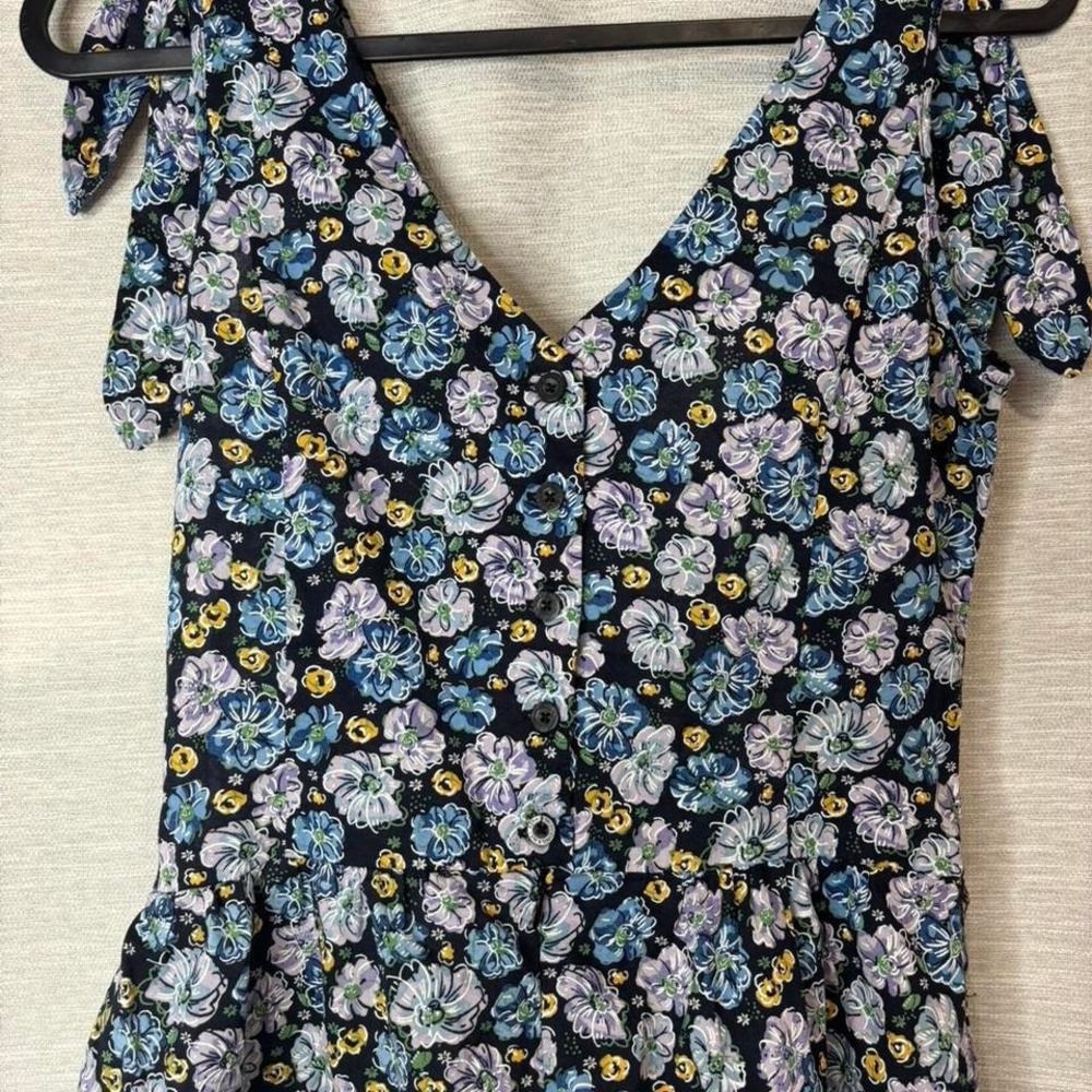 'Miley Cyrus navy floral romper with tie detail. Size M - Picture 2 of 7